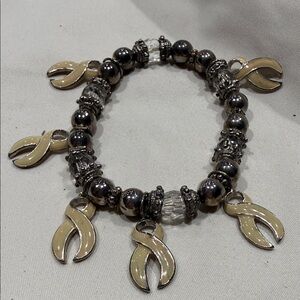 Elegant Cream and Silver Charm Bracelet.